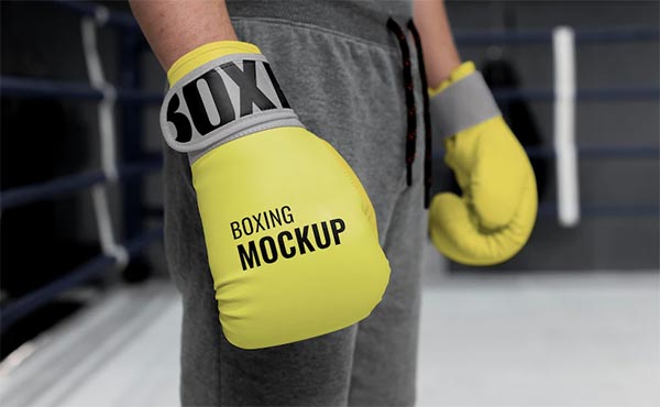 Free Man Wearing Boxing Gloves Mockup